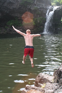John jumping into one of the 7 Sacred Pools in Maui